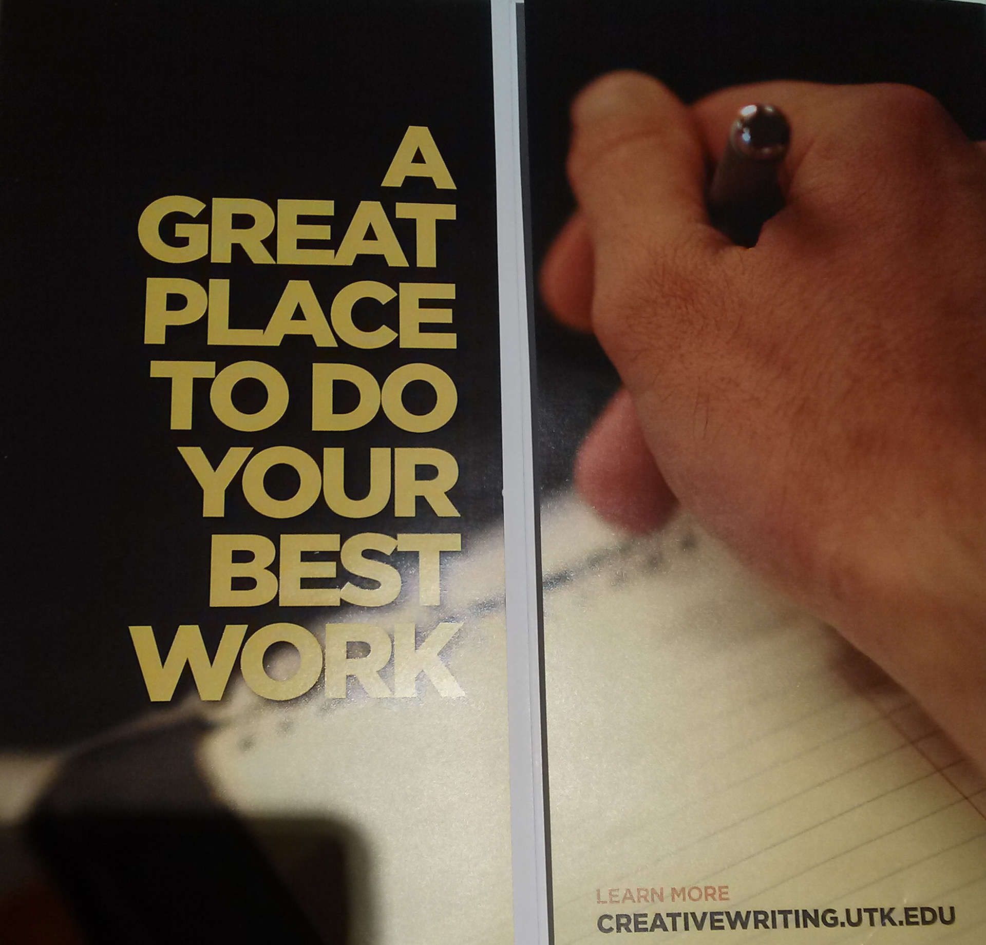 A trifold pamphlet produced as marketing for UTK's MFA in Writing program, showing the author's right hand holding a pen, next to the words 'A great place to do your best work'.